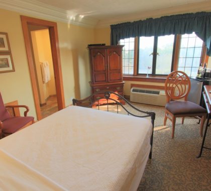 Estate room interior, single bed