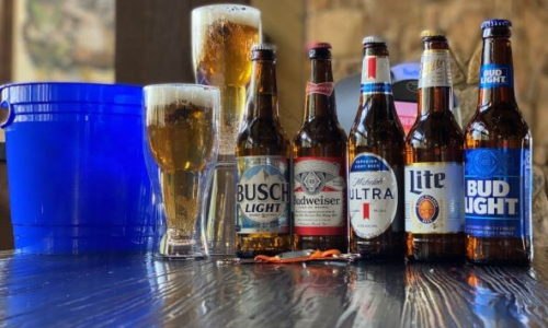 Line of Domestic Beers with 2 glasses and bucket