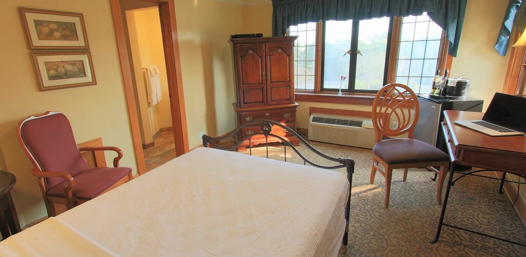 Estate room interior, single bed