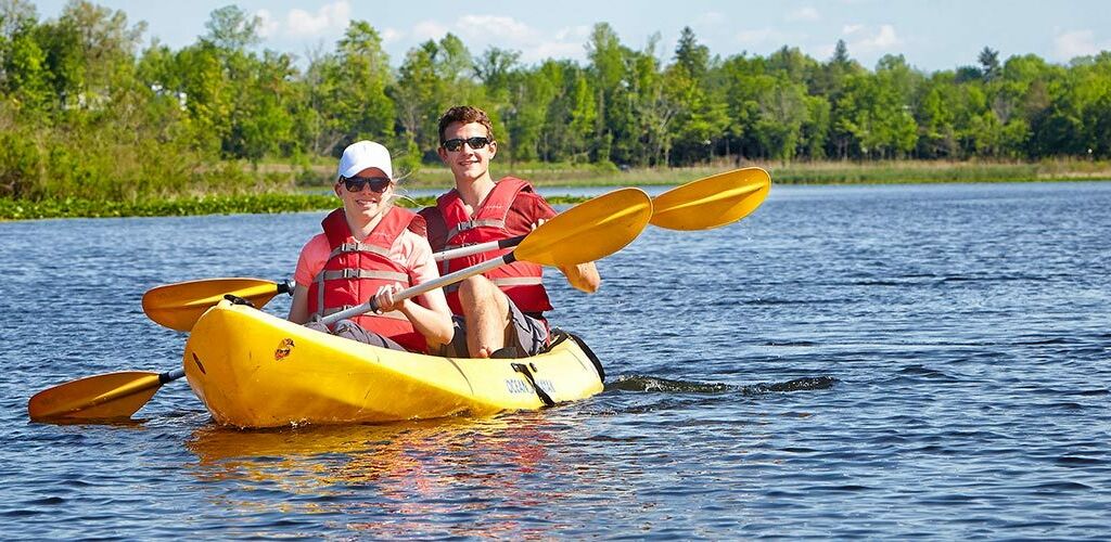 People kayaking on the lake